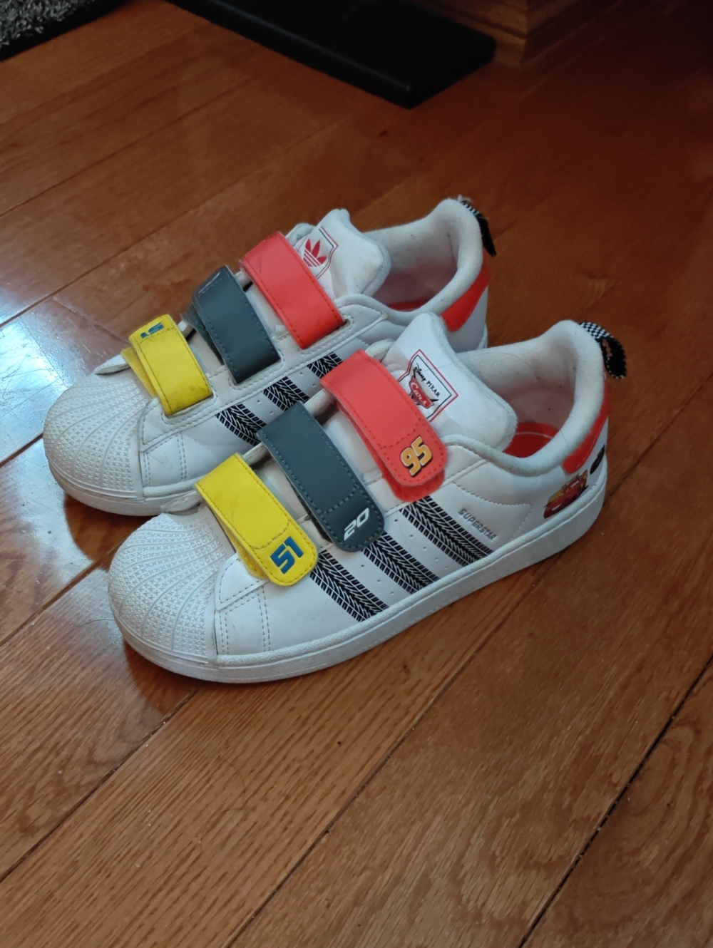 adidas White Kids Sneakers with Yellow, Gray, and Coral Straps